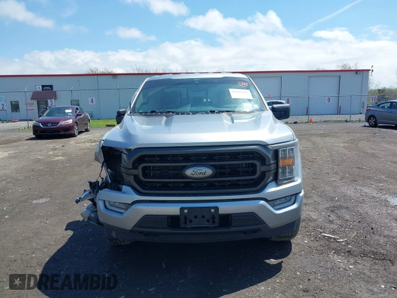 2022 Ford F-150 XL z VIN 1FTEW1EP9NFA65479, wystawiony jako IAAI lot #42165173 z przebiegiem 36 579 mil mil oraz . Historia ofert i sprzedaży dostępna na DreamBid. Obrazek 12.