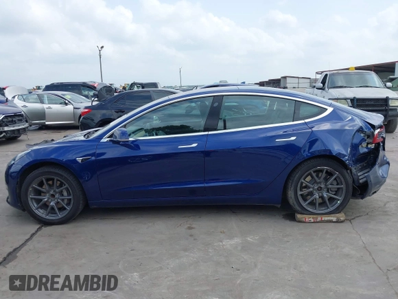 2019 Tesla Model 3 Mid Range with VIN 5YJ3E1EA5KF190453, listed as a IAAI auction lot 41880684 with 58,909 mi miles and . Bid and sale history available at carsss.com. Image 15.