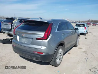 2023 Cadillac XT4 AWD Luxury with VIN 1GYFZBR40PF148068, listed as a IAAI auction lot 41583045 with 35,229 mi miles. Bid and sale history available at carsss.com. Image 4.