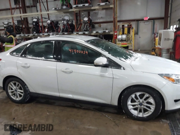 2017 Ford Focus SE with VIN 1FADP3F24HL219177, listed as a IAAI auction lot 41400039 with 88,033 mi miles and . Bid and sale history available at DreamBid. Image 13.