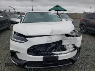 2025 Honda HR-V EX-L with VIN 3CZRZ1H71SM708756, listed as a Copart auction lot 48896755 with 5,231 mi miles and Salvage Title. Bid and sale history available at carsss.com. Image 5.