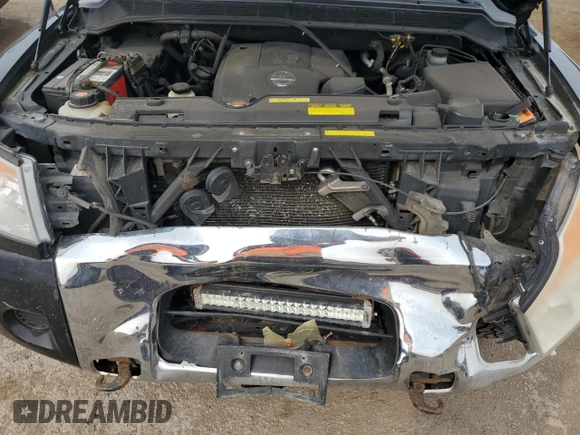 2008 Nissan Titan XE z VIN 1N6AA07C08N301414, wystawiony jako Copart lot #65863554 z przebiegiem 307 023 mil mil oraz Szkoda całkowita • Salvage title. Historia ofert i sprzedaży dostępna na DreamBid. Obrazek 11.