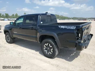 2021 Toyota Tacoma 4WD SR with VIN 5TFCZ5AN5MX268050, listed as a Copart auction lot 53967815 with 74,247 mi miles and Clean Title. Bid and sale history available at carsss.com. Image 2.