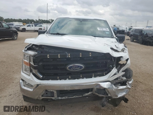 2022 Ford F-150 XL with VIN 1FTFW1E82NFA51713, listed as a Copart auction lot 54581755 with 69,966 mi miles and Salvage Title. Bid and sale history available at DreamBid. Image 5.