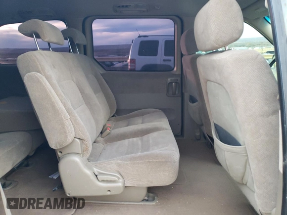 2003 Kia Sedona LX with VIN KNDUP131636359281, listed as a Copart auction lot 81978154 with 180,813 mi miles and Salvage Title. Bid and sale history available at carsss.com. Image 11.