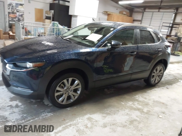 2022 Mazda CX-30 S Select z VIN 3MVDMBBL0NM440747, wystawiony jako IAAI lot #41864038 z przebiegiem 9667 mil mil oraz . Historia ofert i sprzedaży dostępna na DreamBid. Obrazek 14.
