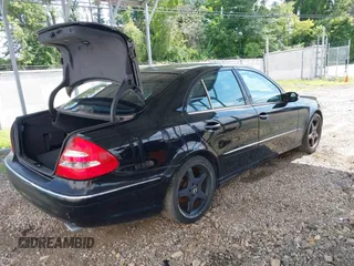 2005 Mercedes-Benz E-Class 3.2L with VIN WDBUF65J05A634879, listed as a IAAI auction lot 39904592 with 4,835 mi miles. Bid and sale history available at carsss.com. Image 4.