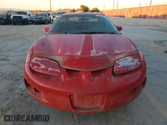 1998 Pontiac Firebird Firebird z VIN 2G2FS22K0W2201603, wystawiony jako Copart lot #79671704 z przebiegiem 309 203 mil mil oraz Czysty tytuł • Clean title. Historia ofert i sprzedaży dostępna na DreamBid. Obrazek 5.
