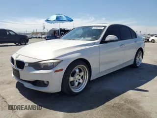 2014 BMW 3 Series 328i with VIN WBA3C1C56EK108374, listed as a Copart auction lot 52902485 with 136,407 mi miles and Salvage Title. Bid and sale history available at carsss.com. Image 1.