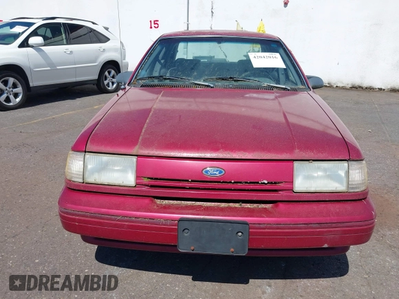 1993 Ford Tempo z VIN 1FAPP36X5PK141523, wystawiony jako IAAI lot #42042016 z przebiegiem 7 892 mil mil oraz . Historia ofert i sprzedaży dostępna na DreamBid. Obrazek 6.