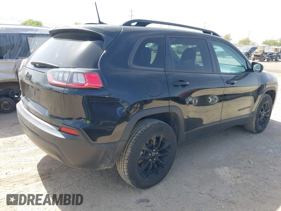 2023 Jeep Cherokee Altitude Lux with VIN 1C4PJMMB9PD111700, listed as a IAAI auction lot 41844750 with 57,441 mi miles. Bid and sale history available at carsss.com. Image 4.