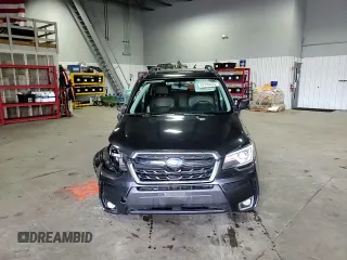 2018 Subaru Forester Touring with VIN JF2SJGWC7JH406748, listed as a Copart auction lot 51750535 with 116,956 mi miles and Salvage Title. Bid and sale history available at carsss.com. Image 12.