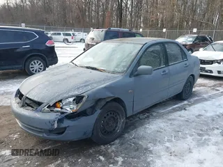 2006 Mitsubishi Lancer ES with VIN JA3AJ26E06U005019, listed as a IAAI auction lot 41381773 with 174,034 mi miles. Bid and sale history available at carsss.com. Image 2.