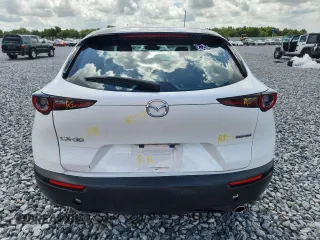 2021 Mazda CX-30 S z VIN 3MVDMAAL9MM212174, wystawiony jako Copart lot #60637625 z przebiegiem 27 575 mil mil oraz Szkoda całkowita • Salvage title. Historia ofert i sprzedaży dostępna na DreamBid. Obrazek 6.
