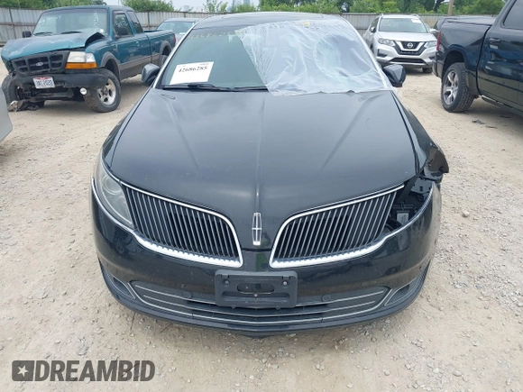 2013 Lincoln MKS EcoBoost with VIN 1LNHL9FT3DG607213, listed as a IAAI auction lot 42686285 with 97,622 mi miles and . Bid and sale history available at DreamBid. Image 6.