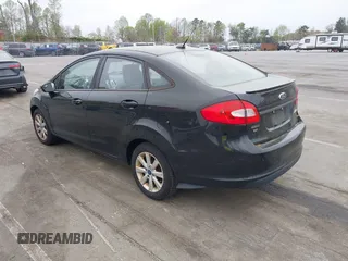 2011 Ford Fiesta SE with VIN 3FADP4BJ5BM221349, listed as a IAAI auction lot 41948737 with 216,540 mi miles. Bid and sale history available at carsss.com. Image 3.