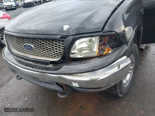 2000 Ford F-150 XL with VIN 1FTRX18W9YNA63551, listed as a IAAI auction lot 41446703 with 1 mi miles. Bid and sale history available at carsss.com. Image 6.