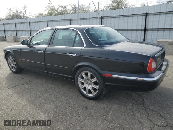 2004 Jaguar XJ with VIN SAJEA71C94SG11566, listed as a Copart auction lot 85281684 with 107,054 mi miles and Clean Title. Bid and sale history available at carsss.com. Image 2.
