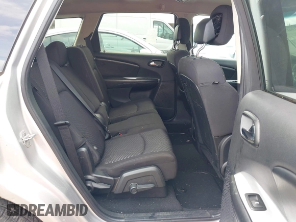 2013 Dodge Journey SXT with VIN 3C4PDDBG4DT571469, listed as a IAAI auction lot 42104433 with 166,068 mi miles and . Bid and sale history available at DreamBid. Image 8.