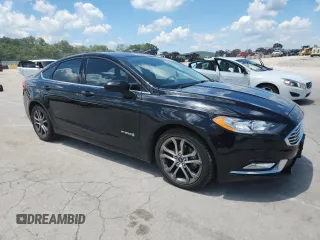 2017 Ford Fusion Hybrid SE with VIN 3FA6P0LU9HR356534, listed as a Copart auction lot 63660315 with 121,195 mi miles and Clean title. Bid and sale history available at DreamBid. Image 4.