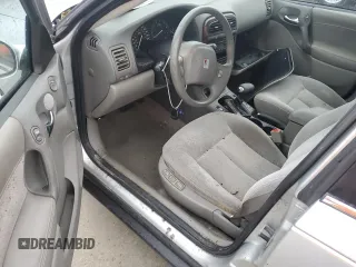 2002 Saturn LS z VIN 1G8JW54R32Y517171, wystawiony jako Copart lot #74849884 z przebiegiem Nie podano mil oraz Szkody całkowita. Historia ofert i sprzedaży dostępna na DreamBid. Obrazek 8.