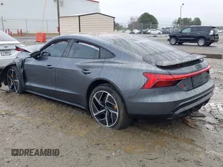 2023 Audi RS e-tron GT z VIN WAUBHBFWXP7903392, wystawiony jako IAAI lot #41020487 z przebiegiem 9046 mil mil oraz . Historia ofert i sprzedaży dostępna na DreamBid. Obrazek 3.