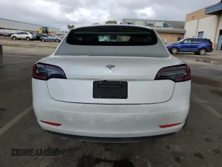 2023 Tesla Model 3 with VIN 5YJ3E1EA7PF488316, listed as a Copart auction lot 49655325 with 60,589 mi miles and Salvage Title. Bid and sale history available at DreamBid. Image 6.