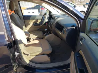 2011 Jeep Compass with VIN 1J4NT1FA4BD208116, listed as a IAAI auction lot 41604552 with 179,633 mi miles. Bid and sale history available at carsss.com. Image 5.