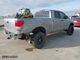 2010 Toyota Tundra 2WD Truck with VIN 5TFRM5F17AX014706, listed as a IAAI auction lot 41580313 with 209,482 mi miles. Bid and sale history available at carsss.com. Image 4.