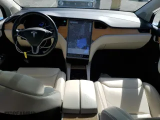 2018 Tesla Model X 75D with VIN 5YJXCBE22JF111938, listed as a Copart auction lot 47000303 with 63,430 mi miles. Bid and sale history available at carsss.com. Image 8.