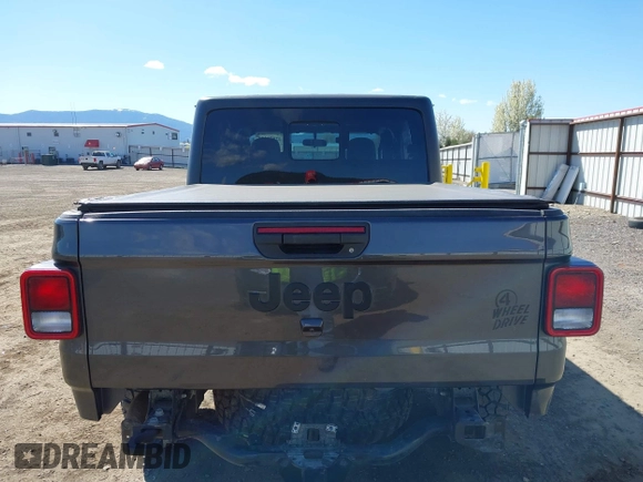 2023 Jeep Gladiator Sport S z VIN 1C6HJTAG2PL575276, wystawiony jako IAAI lot #42056473 z przebiegiem 17 043 mil mil oraz . Historia ofert i sprzedaży dostępna na DreamBid. Obrazek 16.