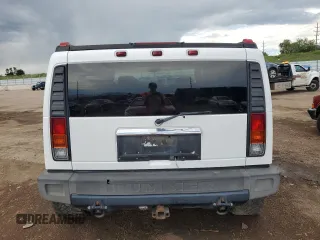 2004 Hummer H2 z VIN 5GRGN23U94H109105, wystawiony jako Copart lot #60548255 z przebiegiem 218 770 mil mil oraz Czysty tytuł • Clean title. Historia ofert i sprzedaży dostępna na DreamBid. Obrazek 6.