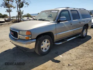 2001 GMC Yukon XL SLT z VIN 1GKFK16T91J287592, wystawiony jako Copart lot #70418704 z przebiegiem 242 950 mil mil oraz Szkoda całkowita • Salvage title. Historia ofert i sprzedaży dostępna na DreamBid. Obrazek 1.