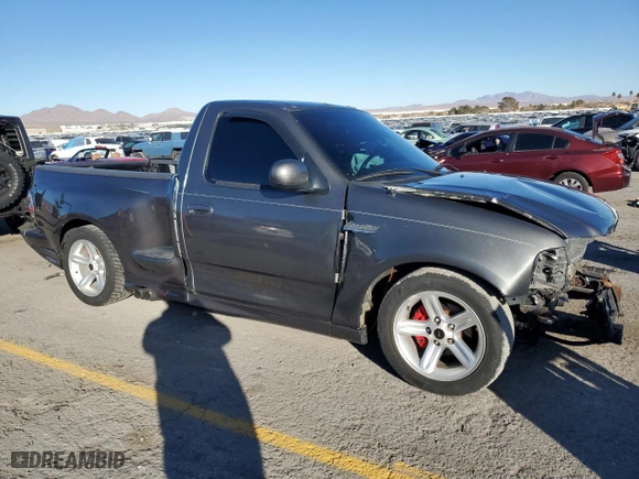 2003 Ford F-150 Lightning with VIN 2FTRF07313CA43362, listed as a Copart auction lot 87544765 with 98,589 mi miles and Salvage Title. Bid and sale history available at carsss.com. Image 4.