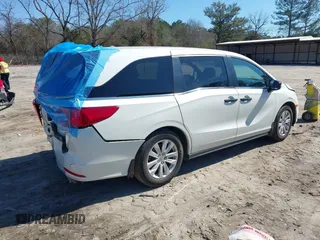 2019 Honda Odyssey LX with VIN 5FNRL6H23KB049236, listed as a IAAI auction lot 41633339 with 96,000 mi miles and . Bid and sale history available at DreamBid. Image 4.