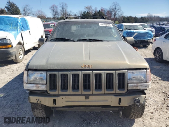 1997 Jeep Grand Cherokee Limited with VIN 1J4GZ78Y4VC567237, listed as a Copart auction lot 49059105 with 177,478 mi miles and Salvage Title. Bid and sale history available at carsss.com. Image 5.