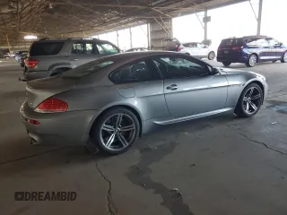 2006 BMW M6 with VIN WBSEH934X6B797428, listed as a Copart auction lot 63462135 with 73,393 mi miles and Salvage title. Bid and sale history available at DreamBid. Image 3.