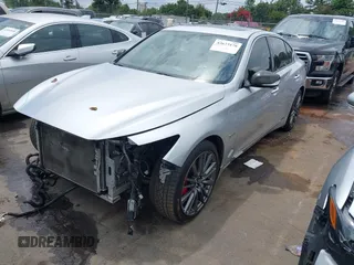 2018 Infiniti Q50 Red Sport 400 with VIN JN1FV7AR8JM481498, listed as a IAAI auction lot 42673176 with 100,332 mi miles and . Bid and sale history available at DreamBid. Image 2.