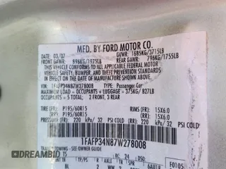 2007 Ford Focus S with VIN 1FAFP34N87W278008, listed as a Copart auction lot 61022545 with 139,575 mi miles and Salvage title. Bid and sale history available at DreamBid. Image 12.