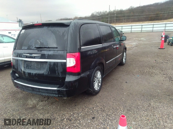 2015 Chrysler Town & Country Touring L with VIN 2C4RC1CG7FR539937, listed as a IAAI auction lot 41817807 with 158,400 mi miles and . Bid and sale history available at carsss.com. Image 4.