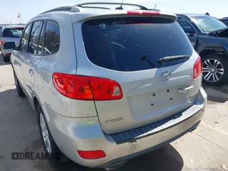 2009 Hyundai Santa Fe SE with VIN 5NMSH13E99H300552, listed as a IAAI auction lot 41772584 with 155,127 mi miles and . Bid and sale history available at DreamBid. Image 3.
