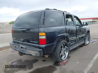 2004 Chevrolet Tahoe LT with VIN 1GNEK13T54J146851, listed as a IAAI auction lot 41990571 with 172,025 mi miles. Bid and sale history available at carsss.com. Image 4.