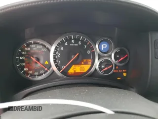 2009 Nissan GT-R Premium z VIN JN1AR54F19M251138, wystawiony jako Copart lot #63123824 z przebiegiem 37 758 mil mil oraz Szkoda całkowita • Salvage title. Historia ofert i sprzedaży dostępna na DreamBid. Obrazek 9.