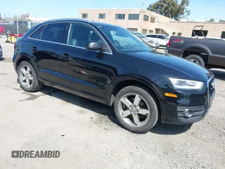 2015 Audi Q3 2.0T Premium Plus with VIN WA1EFCFSXFR013237, listed as a IAAI auction lot 41850031 with 85,293 mi miles. Bid and sale history available at carsss.com. Image 1.