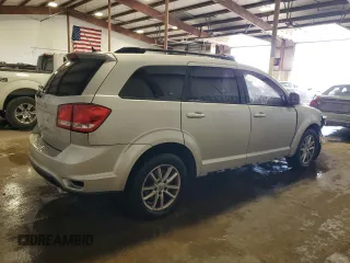 2013 Dodge Journey SXT with VIN 3C4PDCBG3DT699762, listed as a Copart auction lot 53712395 with 145,360 mi miles and Salvage Title. Bid and sale history available at carsss.com. Image 3.