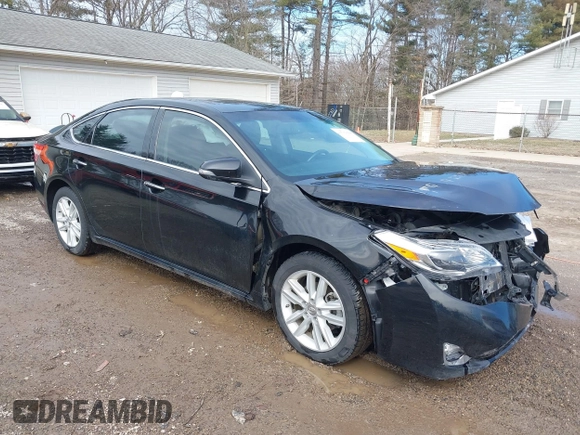 2014 Toyota Avalon Limited with VIN 4T1BK1EB2EU103936, listed as a IAAI auction lot 41703894 with 104,657 mi miles. Bid and sale history available at carsss.com. Image 1.