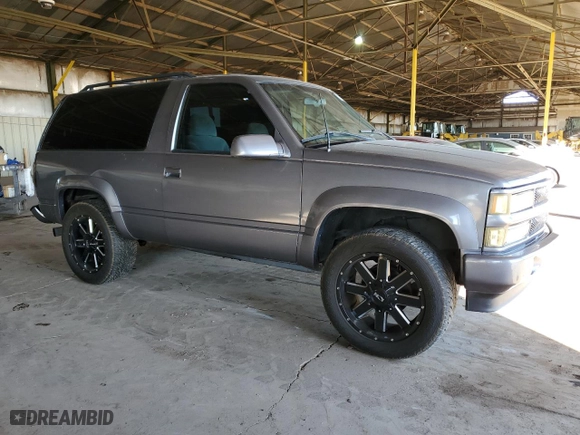 1996 Chevrolet Tahoe with VIN 3GNEK18R0TG147175, listed as a Copart auction lot 78721984 with 210,867 mi miles and Salvage Title. Bid and sale history available at carsss.com. Image 4.