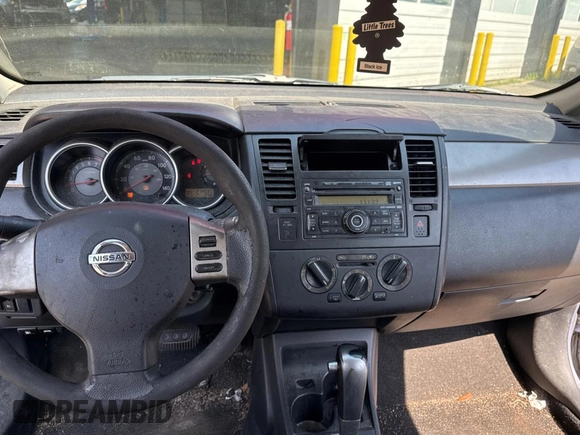 2009 Nissan Versa S with VIN 3N1BC13E99L412868, listed as a Copart auction lot 55990665 with 214,080 mi miles and Clean Title. Bid and sale history available at DreamBid. Image 9.