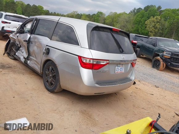 2013 Honda Odyssey LX with VIN 5FNRL5H27DB075559, listed as a IAAI auction lot 42007141 with Not Provided miles and . Bid and sale history available at carsss.com. Image 3.