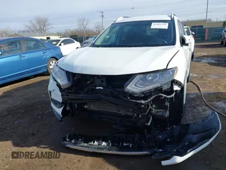 2017 Nissan Rogue SV with VIN KNMAT2MT7HP601954, listed as a IAAI auction lot 41865794 with 136,280 mi miles. Bid and sale history available at carsss.com. Image 6.